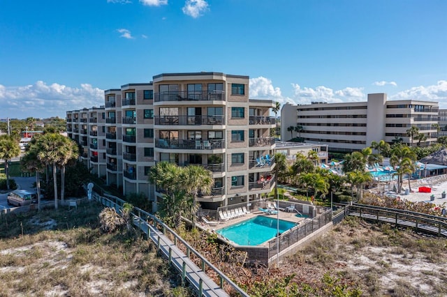 4510 Gulf Blvd Unit 604, St Pete Beach, FL 33706 - view of apartment building / complex featuring a community pool