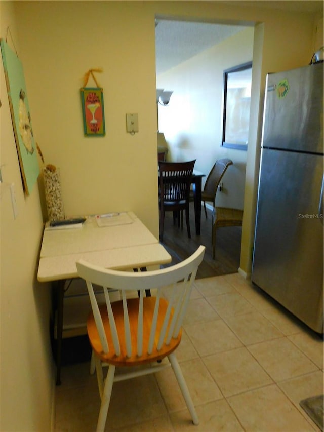 9 Forbes Pl Unit 310, Dunedin, FL 34698 - dining room featuring light tile patterned flooring