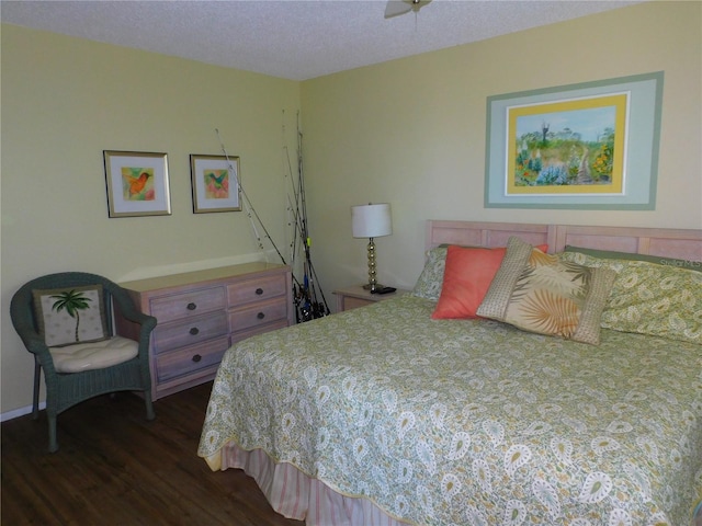 9 Forbes Pl Unit 310, Dunedin, FL 34698 - bedroom with dark wood finished floors