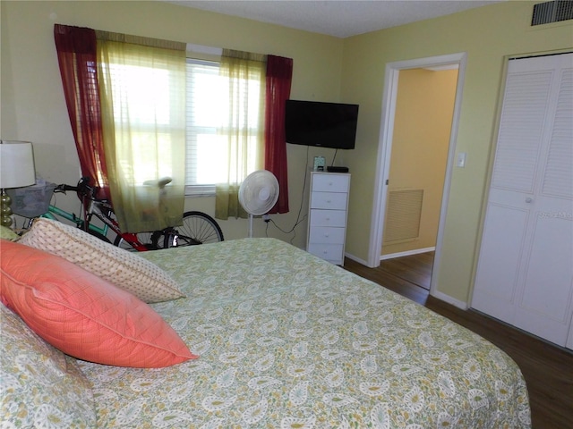 9 Forbes Pl Unit 310, Dunedin, FL 34698 - bedroom with wood finished floors