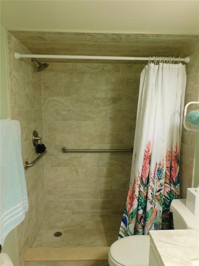 9 Forbes Pl Unit 310, Dunedin, FL 34698 - bathroom featuring tiled shower and vanity
