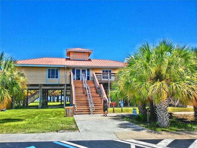 9 Forbes Pl Unit 310, Dunedin, FL 34698 - view of property featuring stairs and driveway