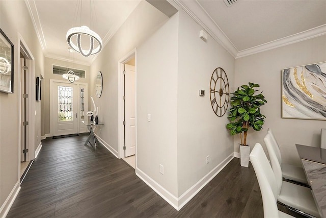 3318 Woodland Brook Way, Wesley Chapel, FL 33543 - entrance foyer featuring a chandelier, dark wood-style floors, and crown molding