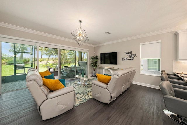 3318 Woodland Brook Way, Wesley Chapel, FL 33543 - living area featuring dark wood-style flooring, crown molding, and a chandelier