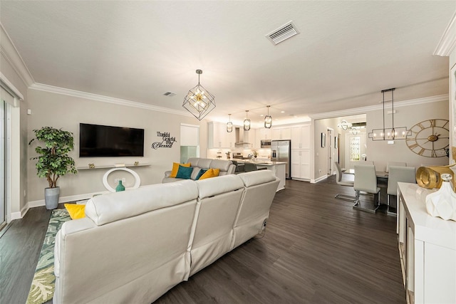 3318 Woodland Brook Way, Wesley Chapel, FL 33543 - living area with dark wood-type flooring, a chandelier, and crown molding