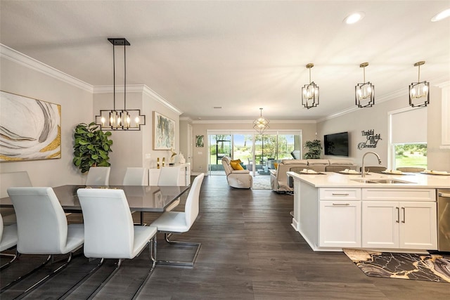 3318 Woodland Brook Way, Wesley Chapel, FL 33543 - dining space featuring a chandelier, dark wood finished floors, crown molding, and recessed lighting