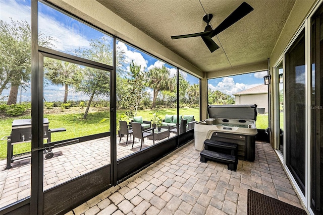 3318 Woodland Brook Way, Wesley Chapel, FL 33543 - sunroom with ceiling fan and an outdoor living space
