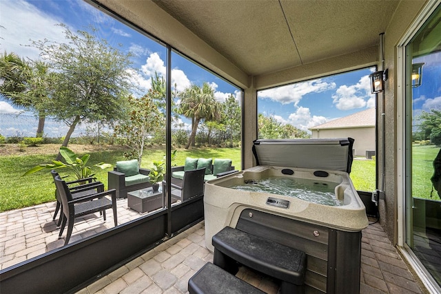 3318 Woodland Brook Way, Wesley Chapel, FL 33543 - sunroom / solarium with an outdoor hangout area and a hot tub
