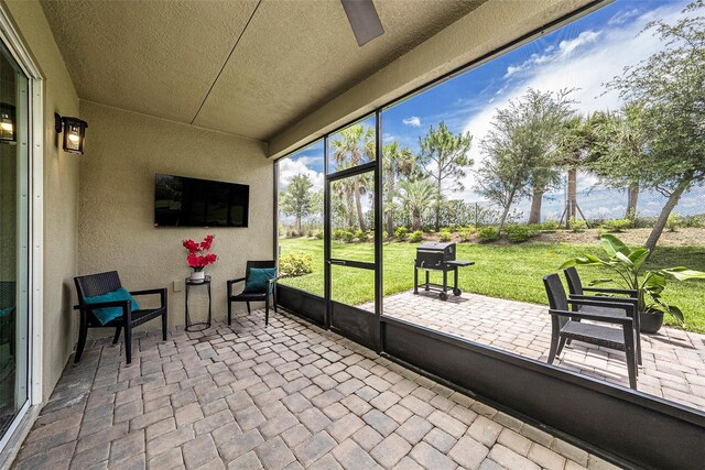 3318 Woodland Brook Way, Wesley Chapel, FL 33543 - sunroom / solarium featuring a ceiling fan