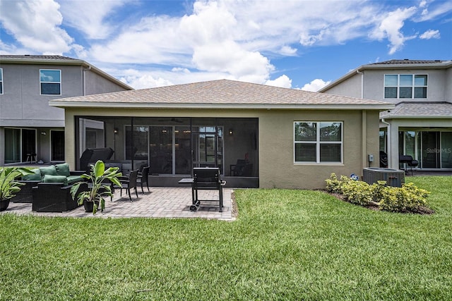 3318 Woodland Brook Way, Wesley Chapel, FL 33543 - rear view of house with stucco siding, a yard, an outdoor hangout area, a patio area, and a sunroom