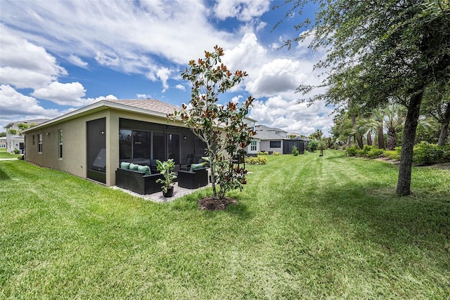 3318 Woodland Brook Way, Wesley Chapel, FL 33543 - view of green lawn with an outdoor living space and a sunroom