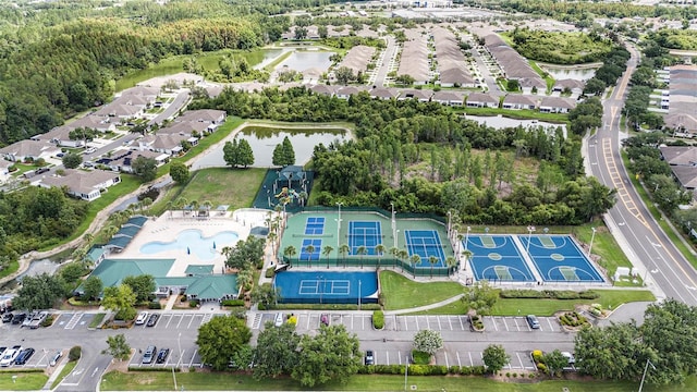 3318 Woodland Brook Way, Wesley Chapel, FL 33543 - aerial view of property's location featuring a nearby body of water and a pool