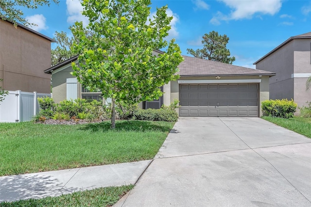 12907 Wildflower Meadow Dr, Riverview, FL 33579 - view of front of property featuring stucco siding, driveway, and an attached garage