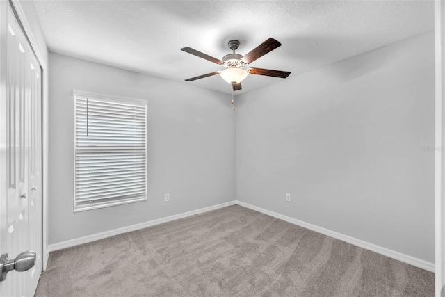 12907 Wildflower Meadow Dr, Riverview, FL 33579 - spare room featuring ceiling fan, carpet floors, baseboards, and a textured ceiling
