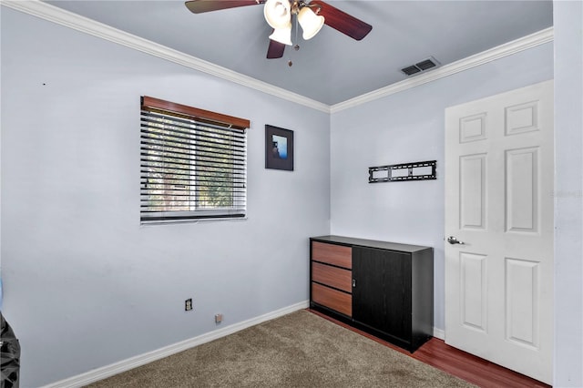 2501 18th Ave S, Saint Petersburg, FL 33712 - unfurnished bedroom featuring crown molding, baseboards, and ceiling fan