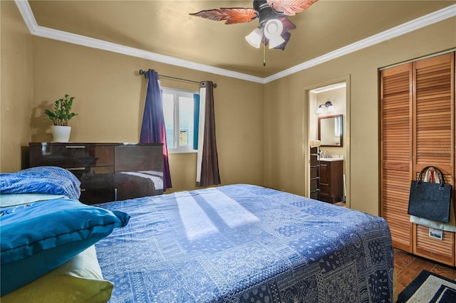 2501 18th Ave S, Saint Petersburg, FL 33712 - bedroom with crown molding, ensuite bath, wood finished floors, and ceiling fan