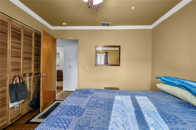 2501 18th Ave S, Saint Petersburg, FL 33712 - bedroom with ornamental molding, wood finished floors, and a closet