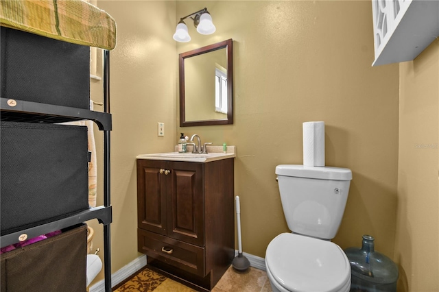2501 18th Ave S, Saint Petersburg, FL 33712 - half bathroom with baseboards, vanity, and toilet