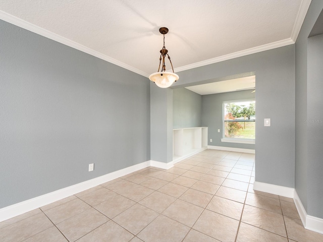 14045 90th Pl, Seminole, FL 33776 - empty room with ornamental molding, light tile patterned floors, and baseboards