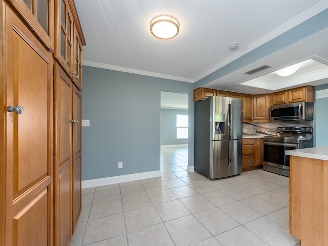 14045 90th Pl, Seminole, FL 33776 - kitchen featuring appliances with stainless steel finishes, light countertops, brown cabinetry, ornamental molding, and glass insert cabinets
