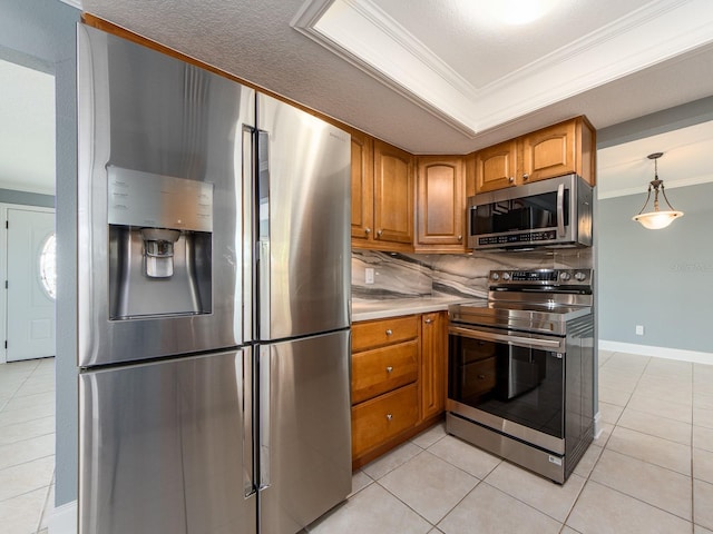 14045 90th Pl, Seminole, FL 33776 - kitchen with stainless steel appliances, crown molding, brown cabinetry, tasteful backsplash, and light tile patterned floors