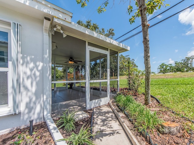 14045 90th Pl, Seminole, FL 33776 - view of patio / terrace featuring a sunroom and a ceiling fan