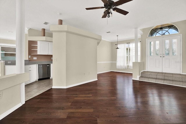 23917 Pow Wow Dr, Lutz, FL 33559 - foyer entrance featuring ceiling fan, wood finished floors, ornamental molding, and baseboards