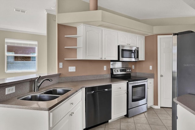 23917 Pow Wow Dr, Lutz, FL 33559 - kitchen featuring stainless steel appliances, a sink, open shelves, white cabinets, and light tile patterned flooring