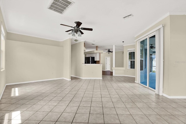 23917 Pow Wow Dr, Lutz, FL 33559 - unfurnished living room featuring ceiling fan, baseboards, plenty of natural light, and ornamental molding