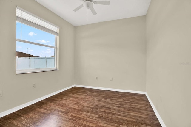 23917 Pow Wow Dr, Lutz, FL 33559 - spare room featuring wood finished floors, baseboards, and ceiling fan