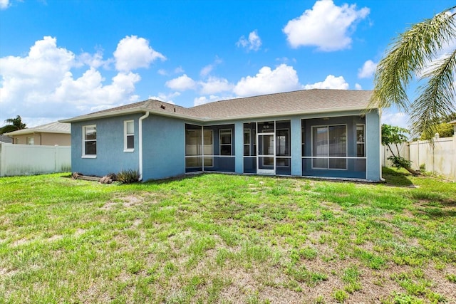 23917 Pow Wow Dr, Lutz, FL 33559 - back of property with stucco siding and a sunroom