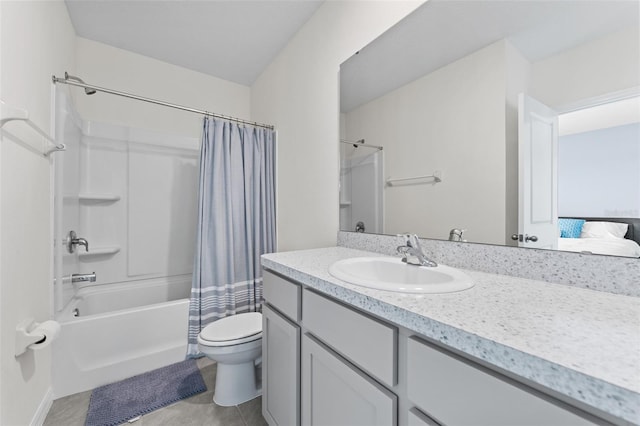308 Mangrove Shade Cir, Apollo Beach, FL 33572 - bathroom featuring shower / bath combo with shower curtain, vanity, and tile patterned flooring