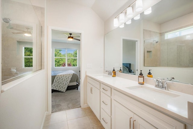 13157 Peachleaf Ave, Riverview, FL 33579 - bathroom with ensuite bath, double vanity, tile patterned floors, a ceiling fan, and tiled shower