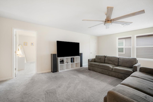 13157 Peachleaf Ave, Riverview, FL 33579 - carpeted living area with a ceiling fan and baseboards