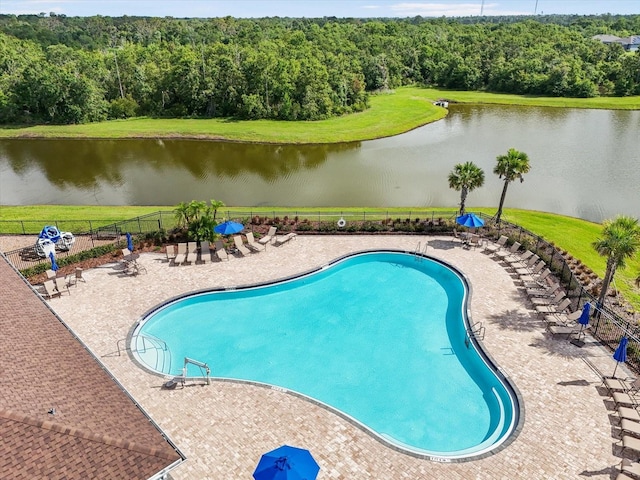 13157 Peachleaf Ave, Riverview, FL 33579 - community pool with a water view, a wooded view, and a patio area