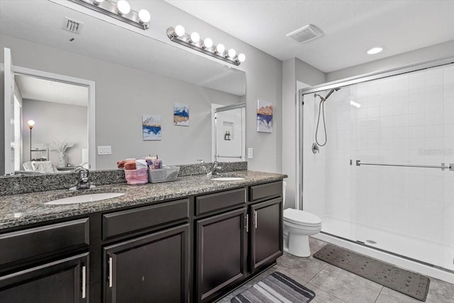 7916 Evergreen Creek Ct, Riverview, FL 33578 - full bathroom featuring a stall shower, double vanity, tile patterned floors, and connected bathroom
