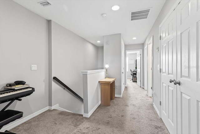 7916 Evergreen Creek Ct, Riverview, FL 33578 - hall with an upstairs landing, light colored carpet, and recessed lighting