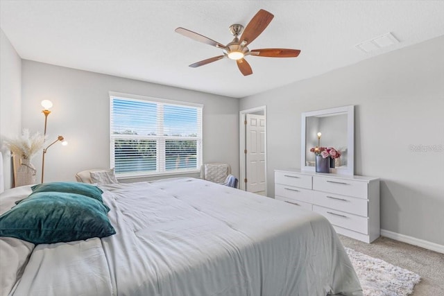 7916 Evergreen Creek Ct, Riverview, FL 33578 - bedroom with light carpet and ceiling fan