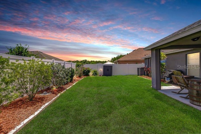 31349 Philmar Ln, Wesley Chapel, FL 33543 - fenced backyard with a shed and a patio