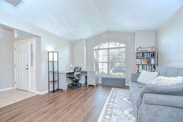 31349 Philmar Ln, Wesley Chapel, FL 33543 - office space featuring wood finished floors and vaulted ceiling