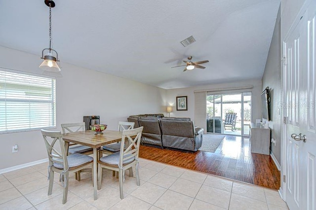 31349 Philmar Ln, Wesley Chapel, FL 33543 - dining room featuring ceiling fan and light tile patterned flooring
