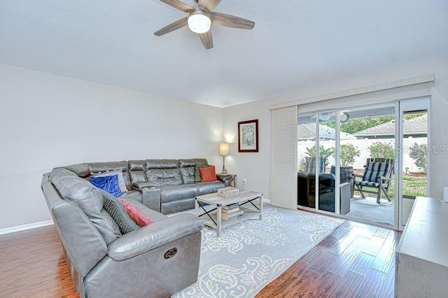 31349 Philmar Ln, Wesley Chapel, FL 33543 - living room with wood finished floors and a ceiling fan