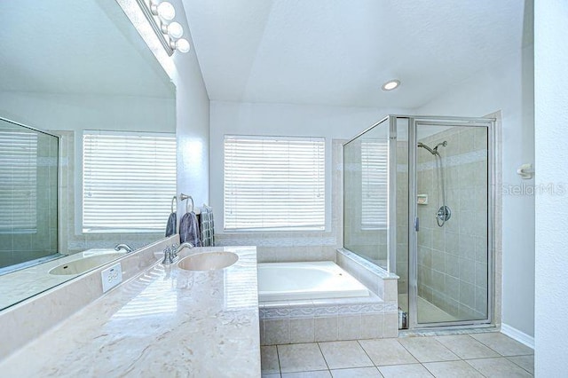 31349 Philmar Ln, Wesley Chapel, FL 33543 - bathroom featuring tile patterned flooring, a garden tub, a stall shower, and vanity