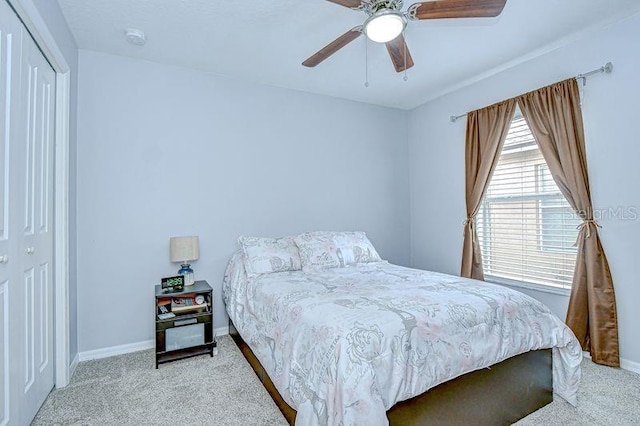 31349 Philmar Ln, Wesley Chapel, FL 33543 - bedroom with carpet, a ceiling fan, and a closet