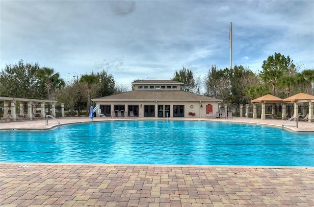31349 Philmar Ln, Wesley Chapel, FL 33543 - community pool with a patio area