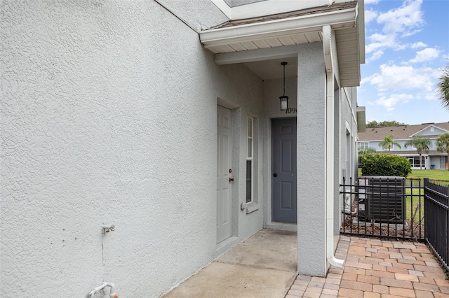 10966 Winter Crest Dr, Riverview, FL 33569 - doorway to property with stucco siding