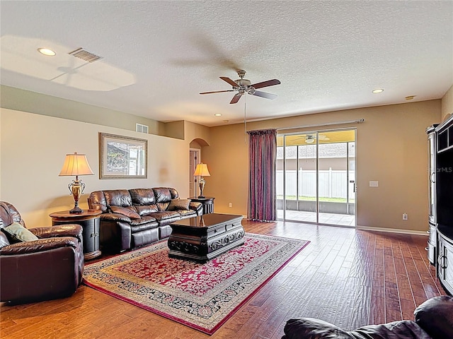 3824 Duke Firth St, Land O Lakes, FL 34638 - living area with arched walkways, ceiling fan, hardwood / wood-style floors, a textured ceiling, and recessed lighting