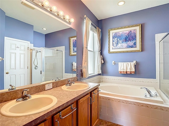 3824 Duke Firth St, Land O Lakes, FL 34638 - full bath with a garden tub, a shower stall, double vanity, and tile patterned floors