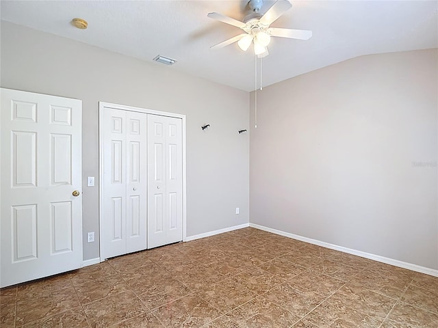 3824 Duke Firth St, Land O Lakes, FL 34638 - unfurnished bedroom with a closet, lofted ceiling, and ceiling fan