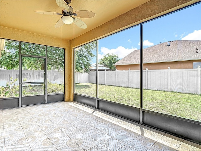 3824 Duke Firth St, Land O Lakes, FL 34638 - unfurnished sunroom featuring ceiling fan